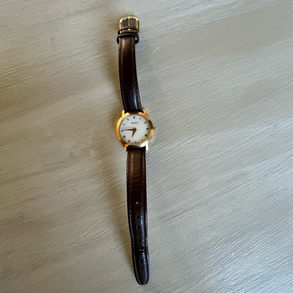 Gucci watch preowned condition.